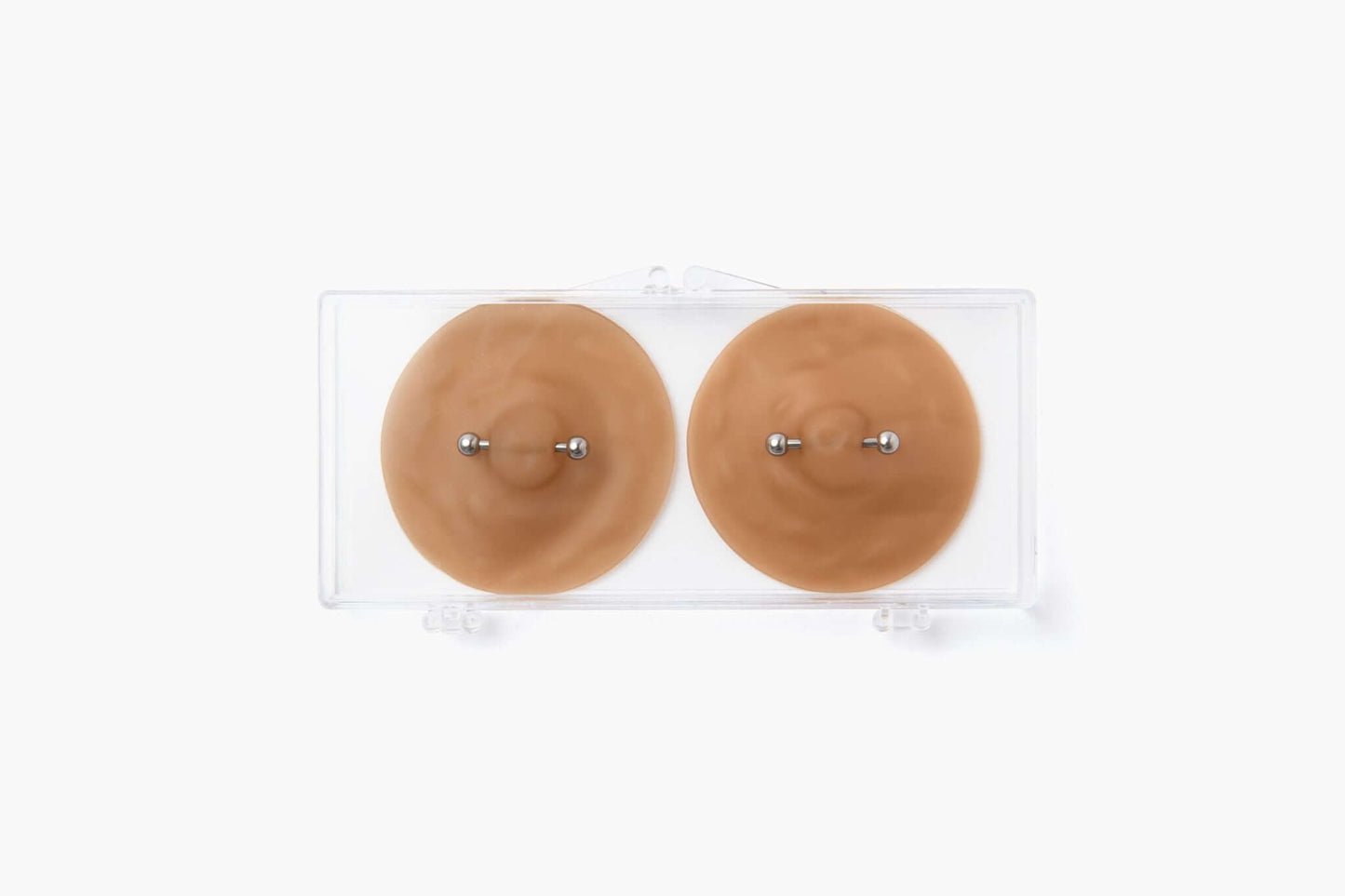 Pierced pasties for fake nipple piercings, image of nipple piercing pastie Pierced pasties for fake nipple piercings