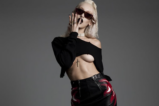 bella hadid posing for a photo wearing nikkys nips nipple enhancers