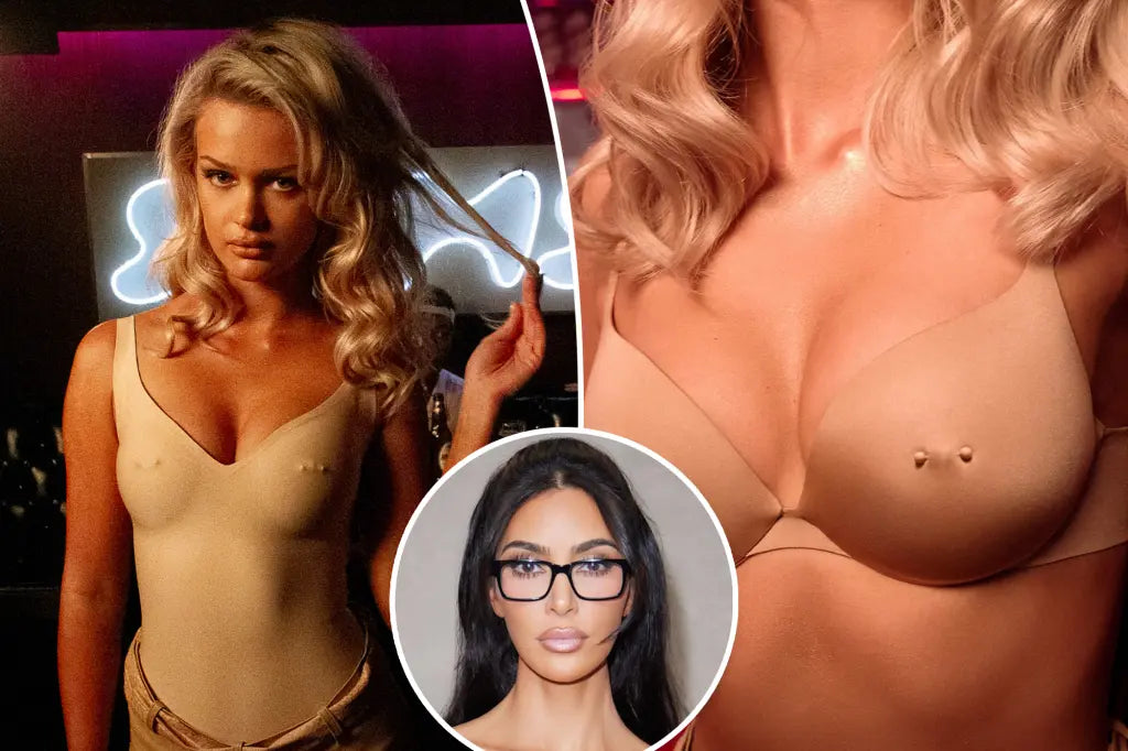 Kim Kardashian confidently showcasing the SKIMS Ultimate Pierced Nipple Push-Up Bra, featuring a raised nipple detail and a visible faux piercing, under a fitted top.